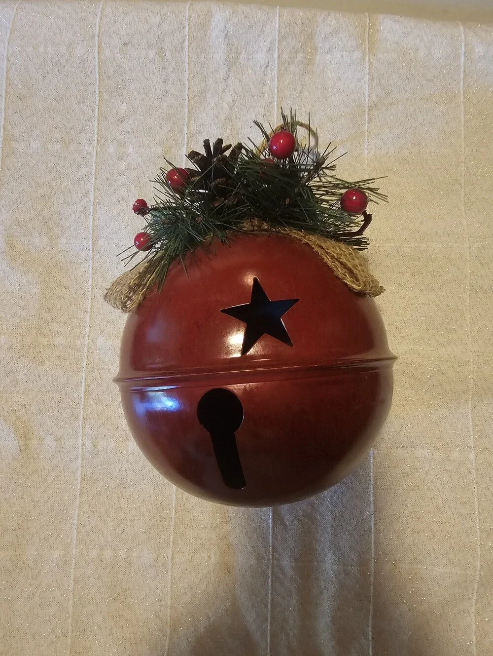 Large Rustic Red Bell Christmas Decor with Star Cutouts & Burlap Bow